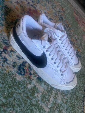Nike Kids White Sneakers with Black Swoosh